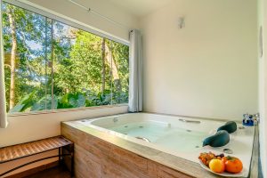 Velinn Pousada Jardim da Mantiqueira é hospedagem em Monte Verde com hidromassagem